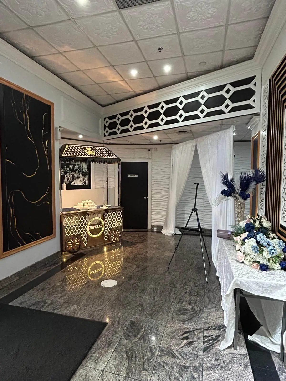 Marble-floored reception hallway leading from the lobby to the ballrooms.