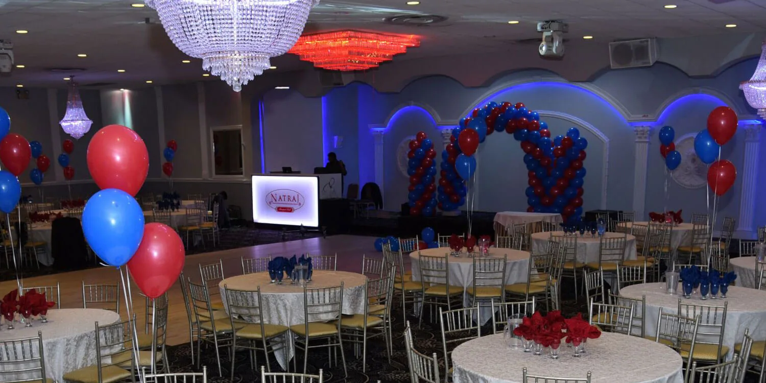 Balloon arch and garland set up for a birthday party.
